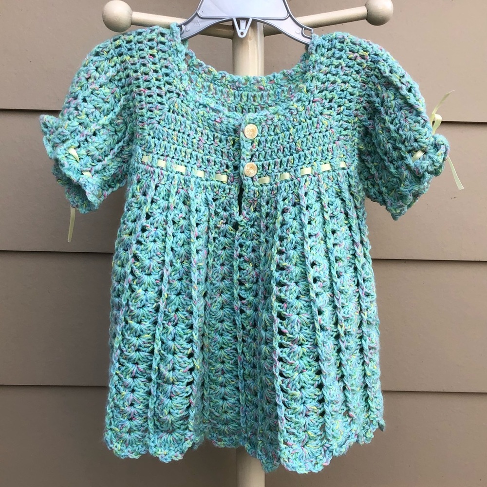 Hand-crocheted pullover sweater.